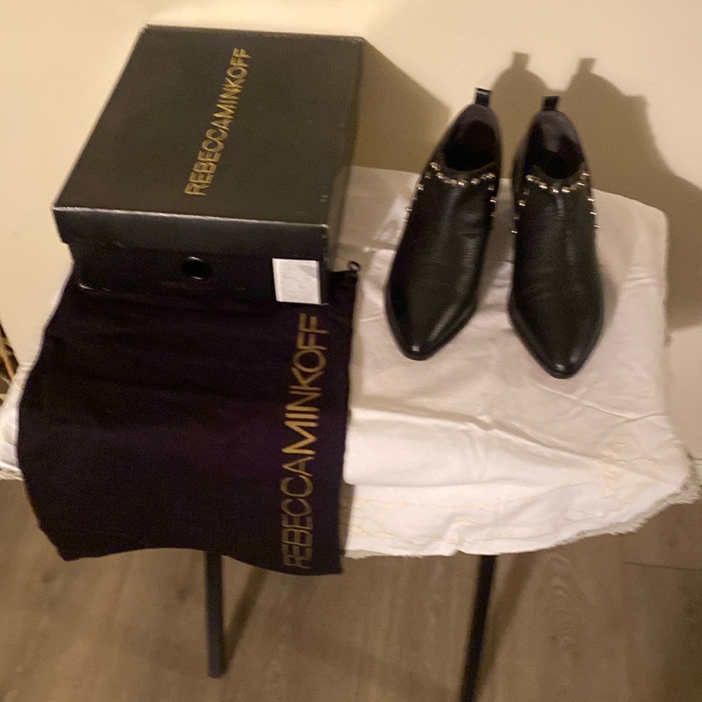 Rebecca Minkoff black leather ankle boots gold studs across the front. New Nev
